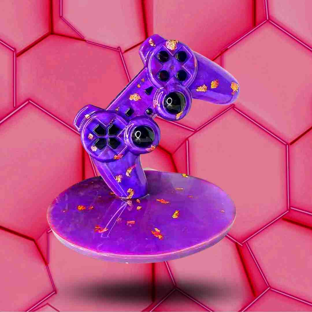 Décoration manette Playstation violet et doré