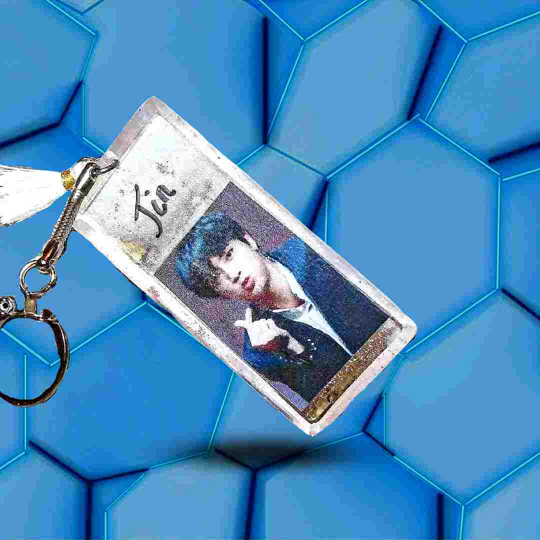 Porte-clés BTS à paillettes avec le portrait de Jin