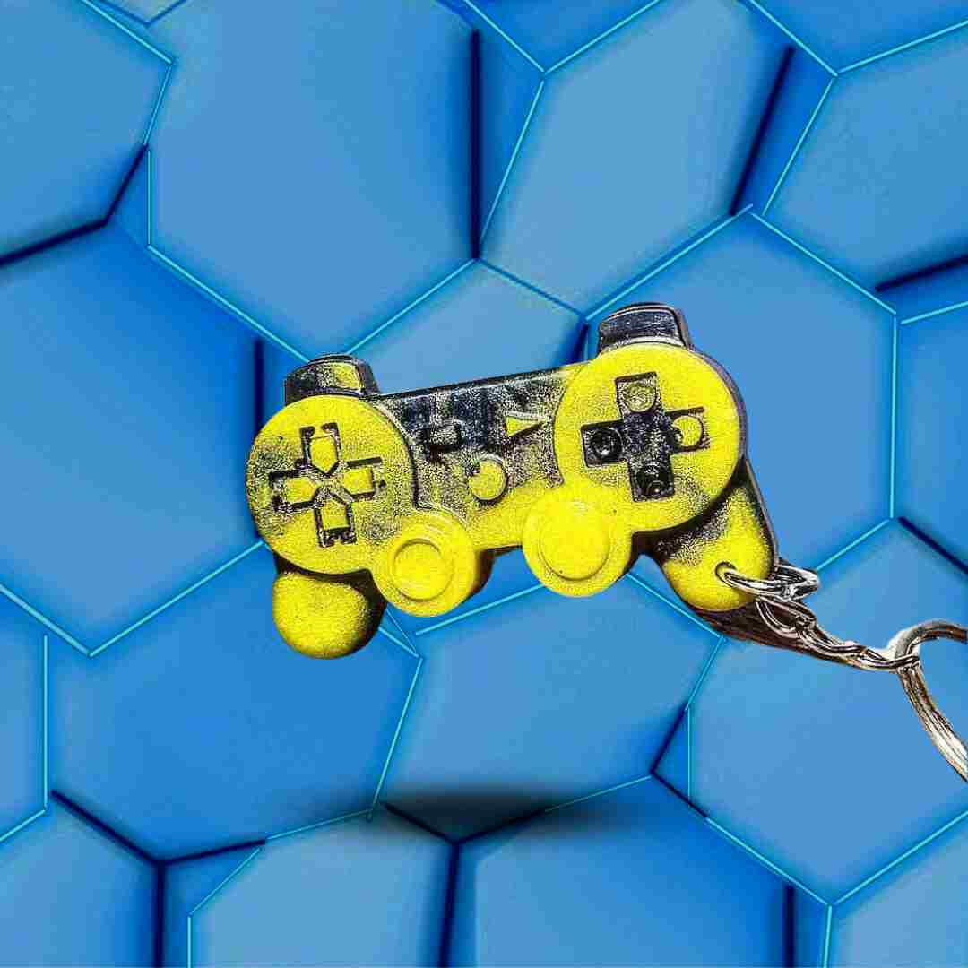 Porte-clés manette Playstation jaune et noir