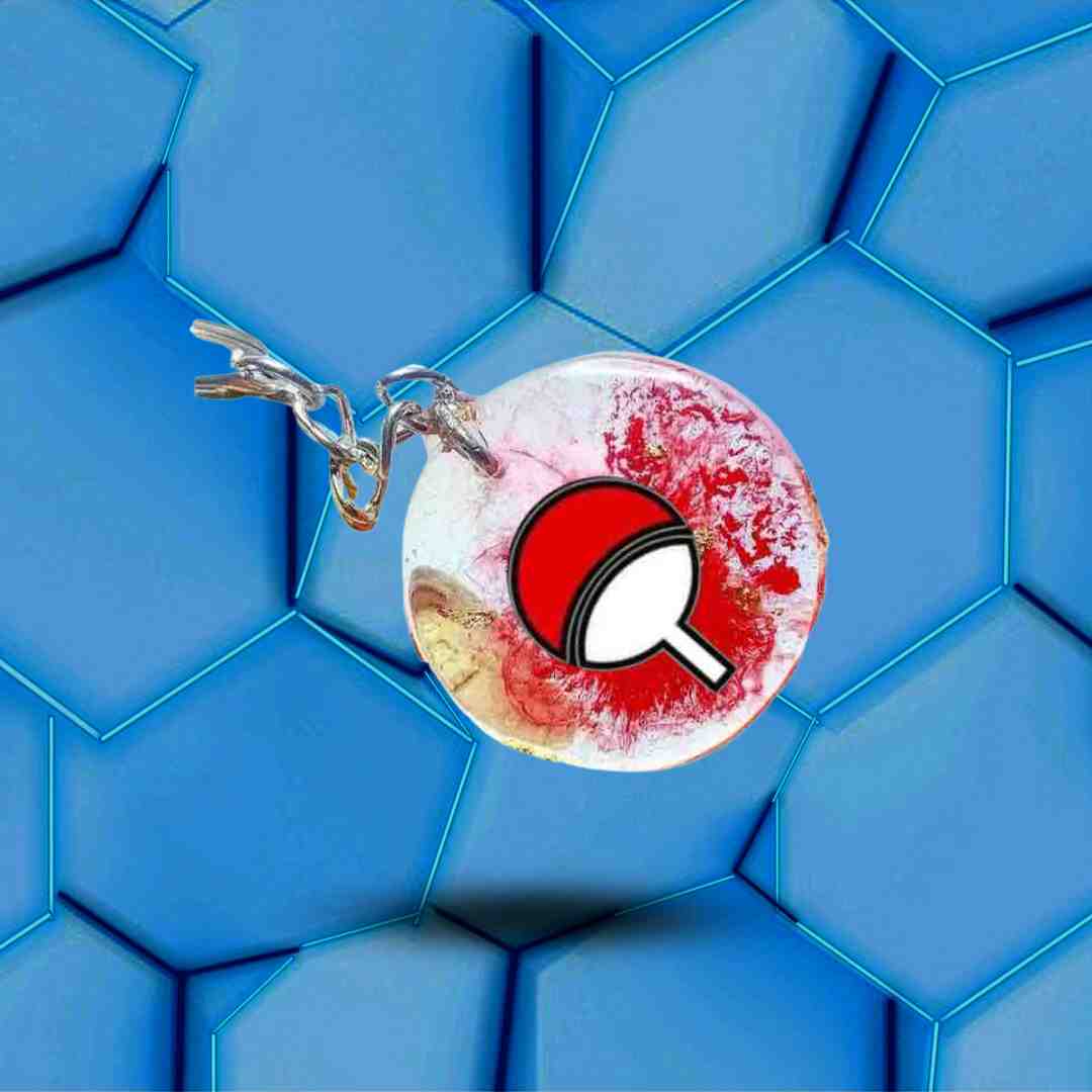 Porte-clefs rond rouge Naruto avec l'emblème Uchiwa