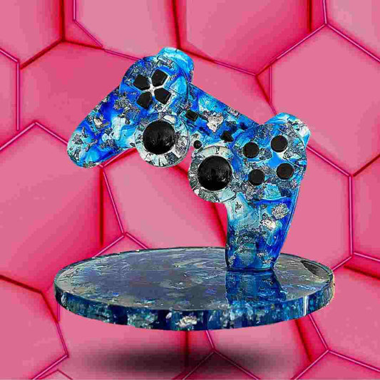 Décoration manette Playstation bleu et argenté, transparente