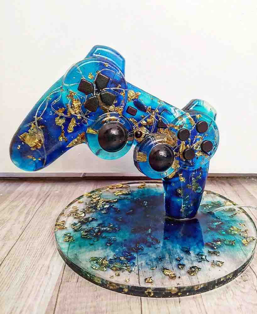 Décoration manette Playstation bleu et doré